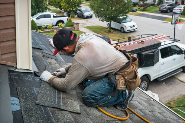 Professional Roofing technician working in Harperville, MS